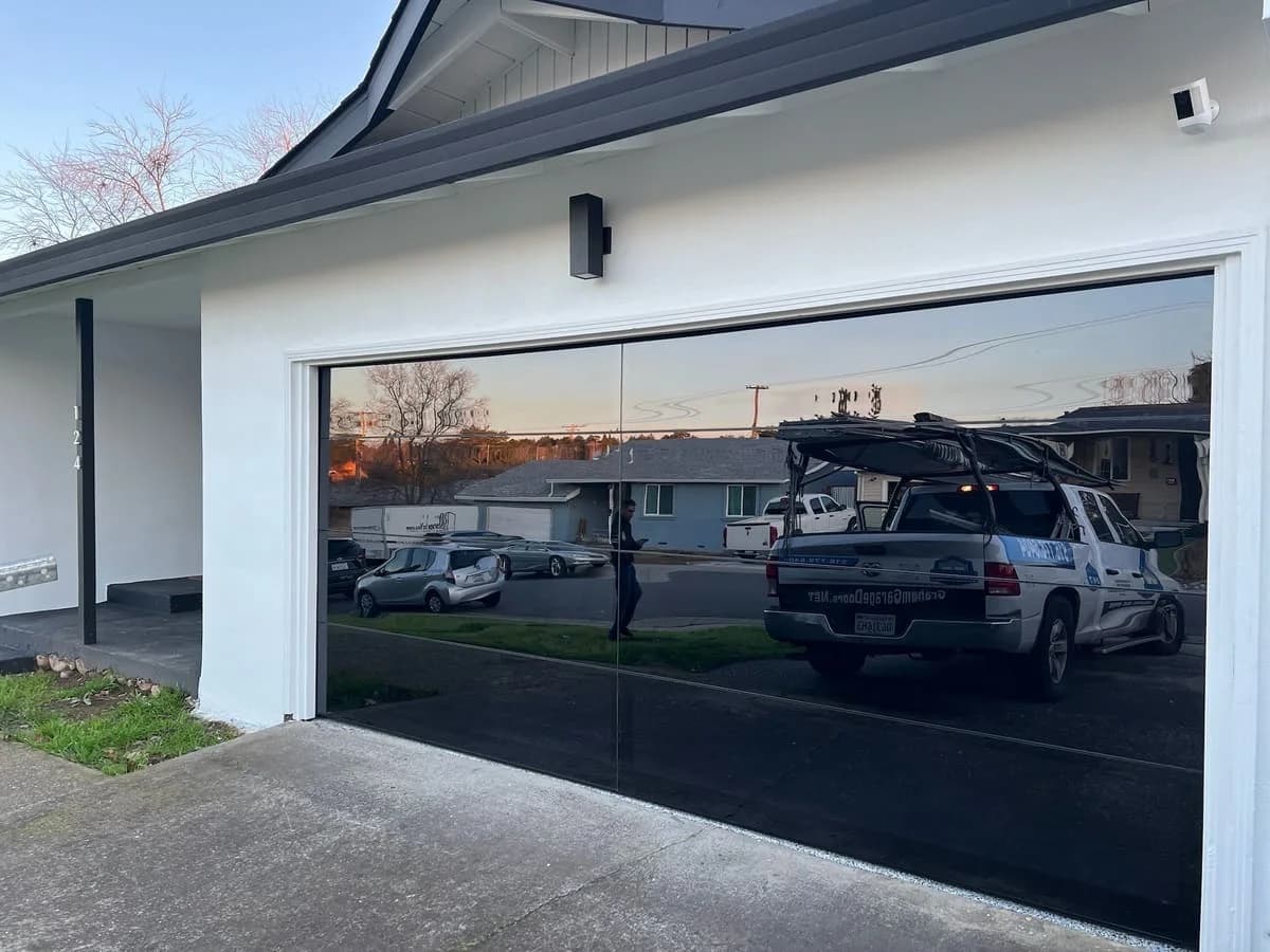 Custom glass residential garage door installation